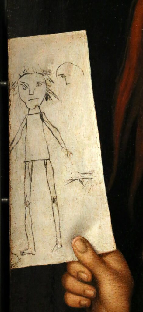 Ein Ausschnitt aus einem Gemälde. Wir sehen eine Hand, die ein Stück Papier hält. Mit wenigen Strichen wurden darauf eine Person und ein halber Kopf gezeichnet.