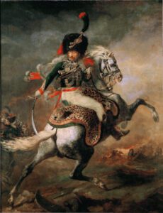 Das Gemälde zeigt einen Mann in einer prächtigen uniform und einer schwarzen, zylindrischen Pelzmütze, auf einem weißen Pferd durch eine Schlacht reitend. Er sitzt auf einem Sattel aus Leopardenfell und schwingt einen Säbel. Sein Pferd bäumt sich auf und er muss sich am Zaumzeug festhalten.