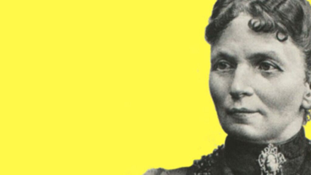 Freigestelltes Porträt einer Frau vor zitronengelbem Hintergrund (Emilie Bach).